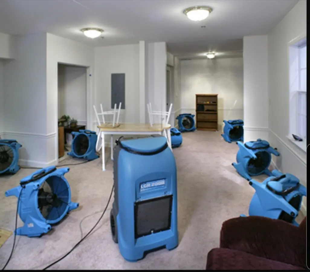 Air movers and dehumidifier setup for Water Damage Restoration in Easton